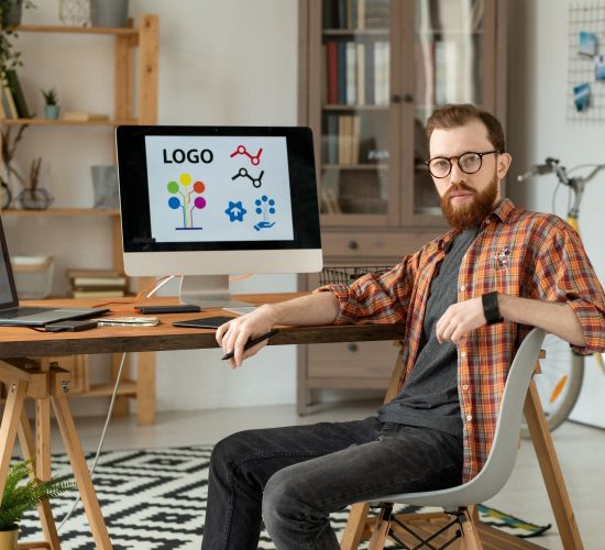 handsome-brand-designer-at-desk-2021-09-24-03-20-05-utc-1-min